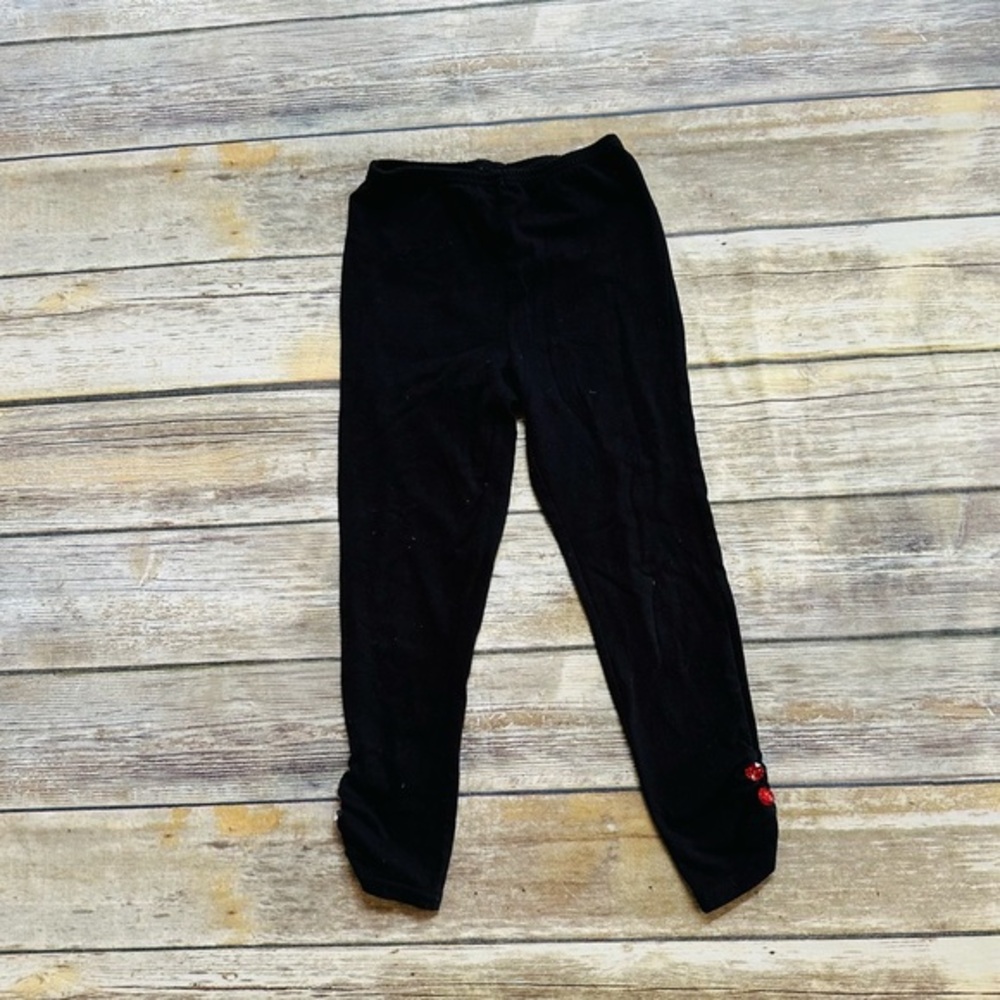 Girls cute black leggings w/ red gems! Size 6
